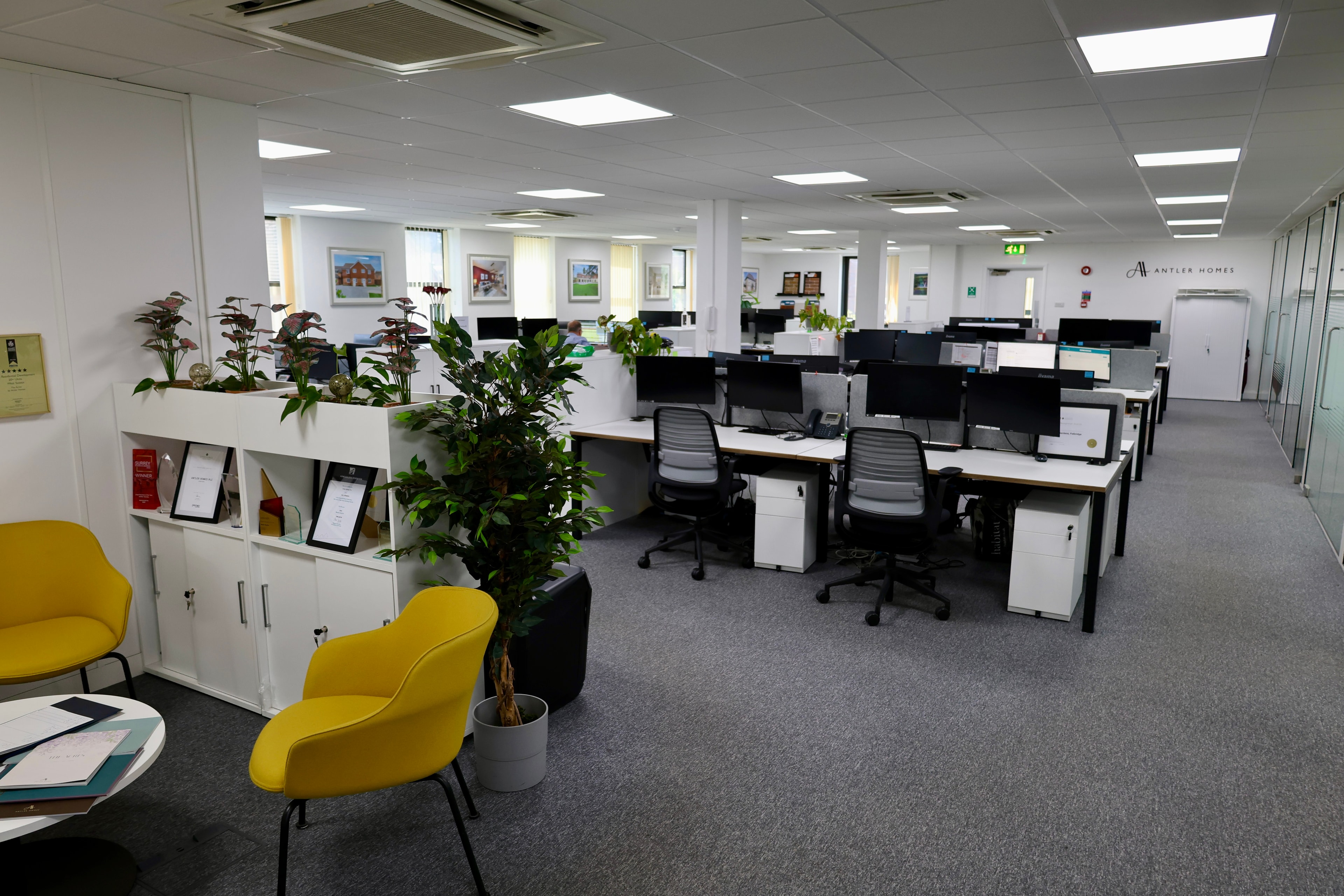 Private office suite with professional desk setup